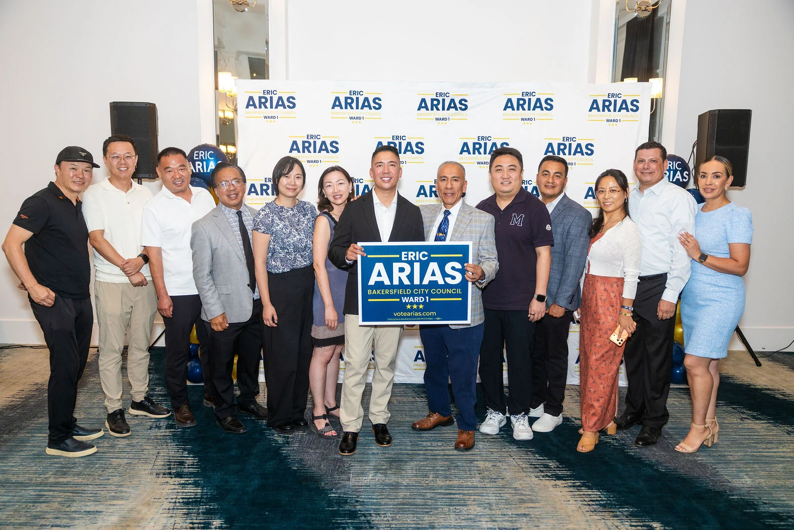 Eric Arias with a group of campaign supporters at the kickoff